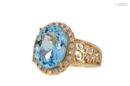 A TOPAZ AND DIAMOND RING