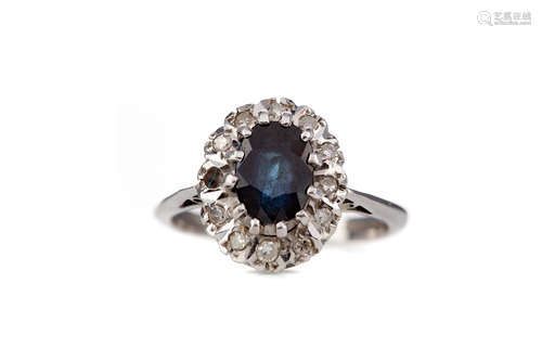 A PARTIAL SAPPHIRE AND DIAMOND CLUSTER RING