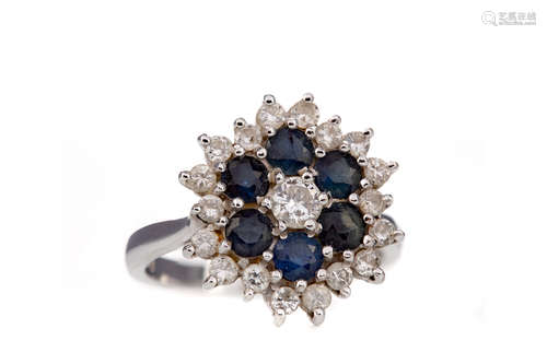 A SAPPHIRE AND DIAMOND CLUSTER RING