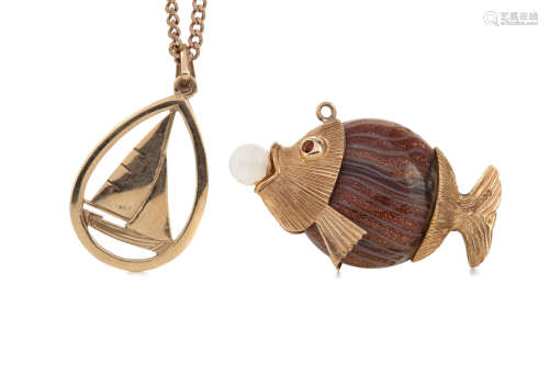 A GOLD SHIP NECKLACE AND FISH PENDANT
