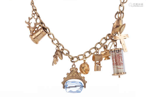 A GOLD CHARM BRACELET