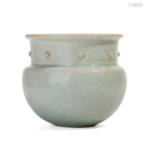 A QINGBAI JAR WITH RAISED BOSSES