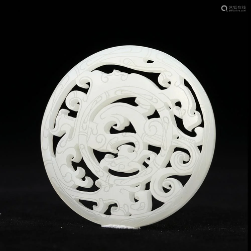 A CARVED JADE 'DRAGON' PENDANT