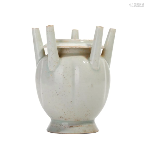 A WHITE-GLAZED EWER