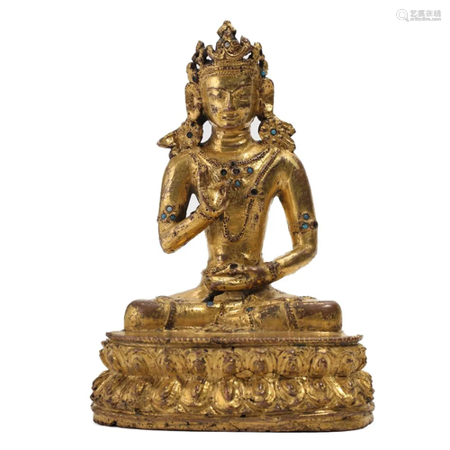 A GILT BRONZE FIGURE OF SEATED VAJRASATTVA