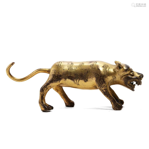 A GILT BRONZE MYTHICAL BEAST