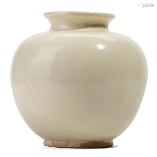 A WHITE GLAZED JAR