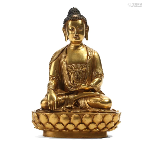 A GILT BRONZE FIGURE OF SEATED SHAKYAMUNI