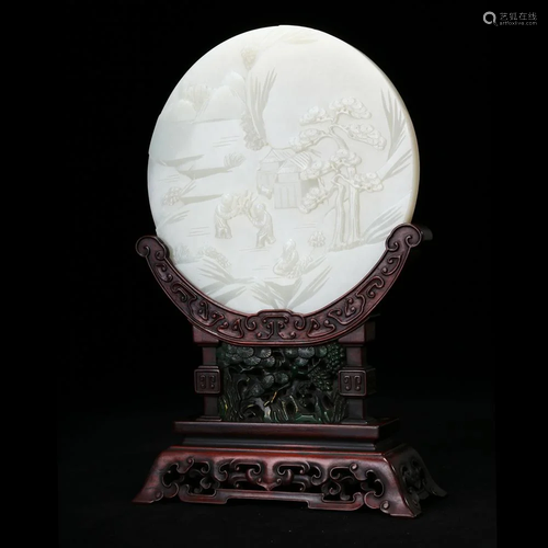 A WHITE JADE 'LANDSCAPE AND FIGURES' TABLE SCREEN