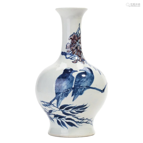 A BLUE AND WHITE AND COPPER RED 'BIRDS' VASE