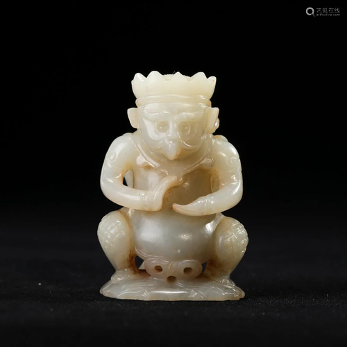 A WHITE JADE 'GARUDA' PENDANT