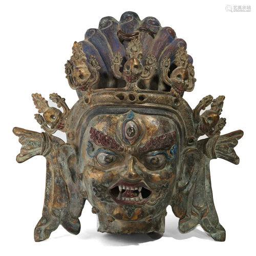 A BRONZE GUARDIAN HEAD