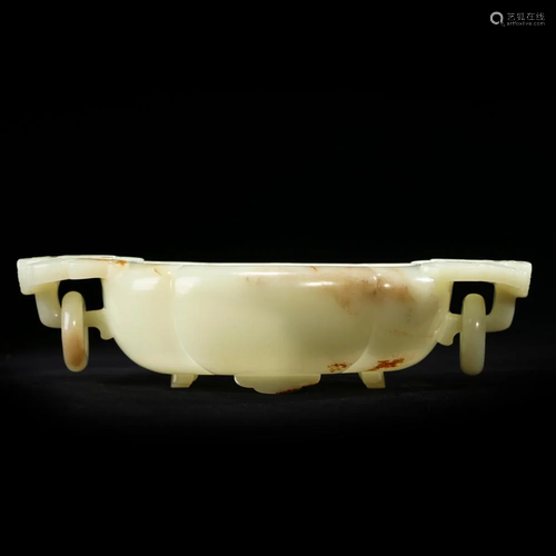 A CELADON JADE TRIPOD CENSER WITH HANDLES