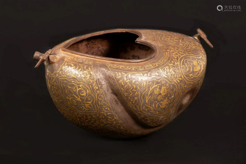 A persian Kashkul decorated with gold in organic design