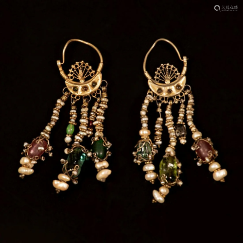 A pair of gilt silver and natural pearl earrings -
