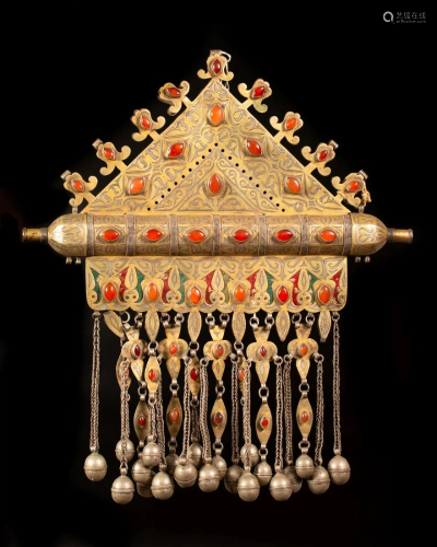 A large and impressive gilded silver and textile Tumar