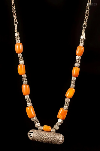 A silver and amber beads necklace with hirz pendant -