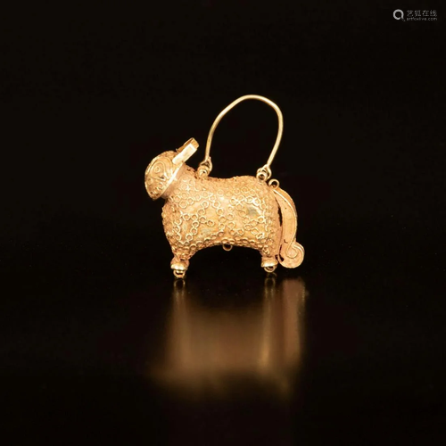 An antique 14K Gold Persian Lion shaped earring