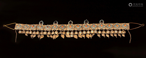 A fine gilt silver headpiece inset with Turquoise and