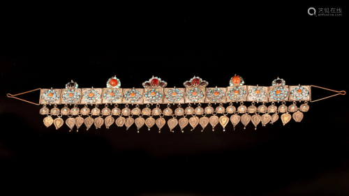 A fine silver headpiece inset with Turquoise and Coral