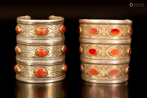 Two gilt silver bracelets inset with carnelian -