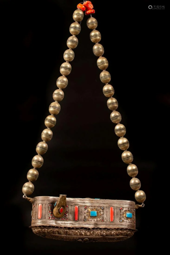 A silver Kashkul (beggar's bowl) decorated with