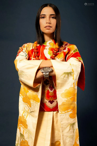 A Japanese embroidered silk Kimono for a woman