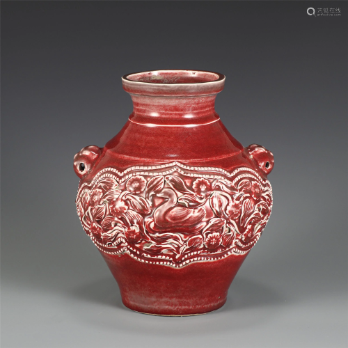 A CHINESE RED GLAZE INCISED FLOWER-BIRD PORCELAIN JAR