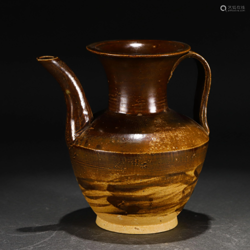 A CHINESE BROWN GLAZED POTTERY EWER
