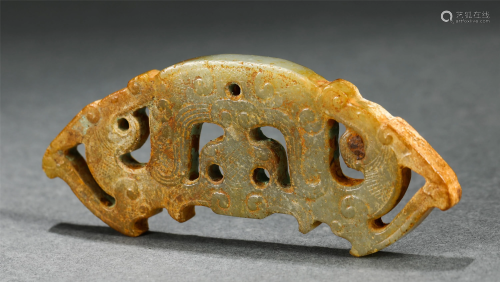 A CHINESE HOLLOW-OUT JADE BI