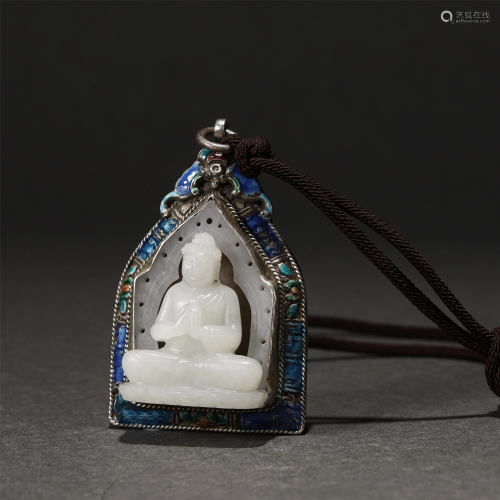 A CHINESE JADE CARVED BUDDHA PENDANT