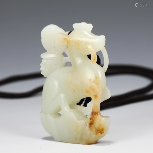 A CHINESE JADE CARVED BEAST DECORATION