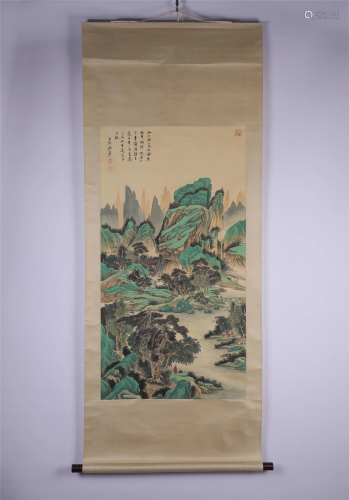 A CHINESE SCROLL PAINTING OF LANDSCAPE AND FIGURES