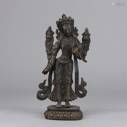 A CHINESE BRONZE STANDING STATUETTE OF GUANYIN