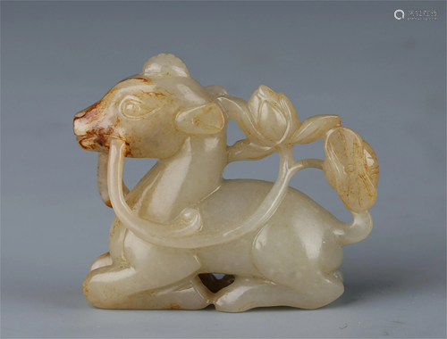 A CHINESE JADE CARVING OF DEER AND LOTUS