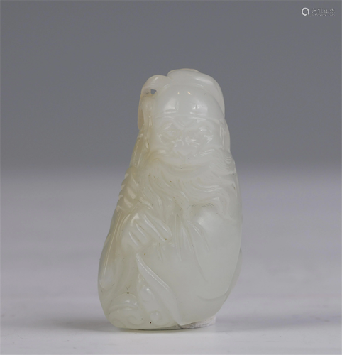 A CHINESE JADE CARVED FIGURINE