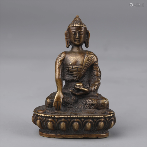 A CHINESE BRONZE STATUETTE OF MEDICINE BUDDHA