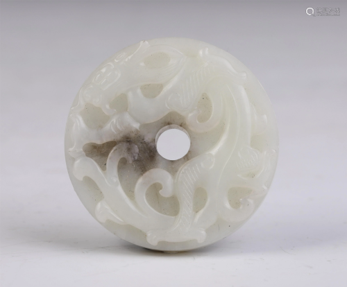 A CHINESE WHITE JADE CARVED CHI-DRAGON PENDANT