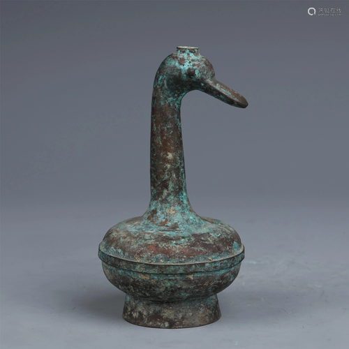 A CHINESE BRONZE DUCK SHAPE CANDLE HOLDER