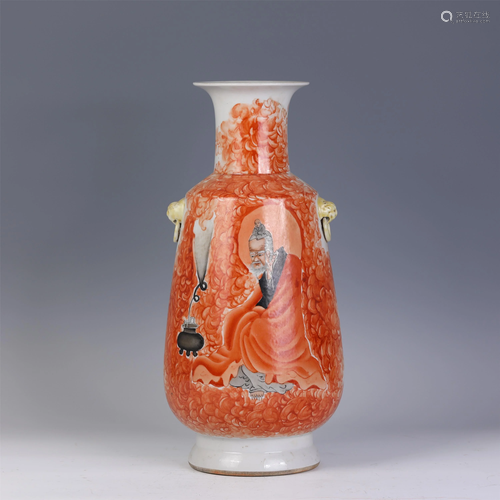 A CHINESE IRON-RED PORCELAIN VASE WITH BEAST HAN…