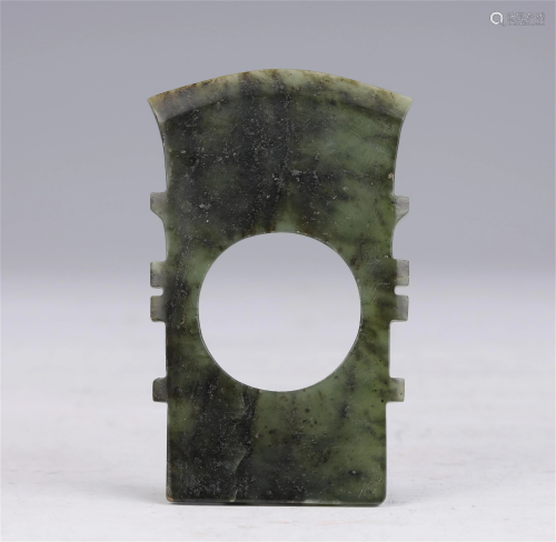 A CHINESE CARVED JADE AX
