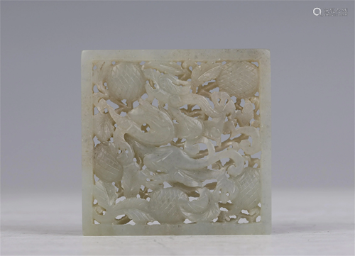 A CHINESE JADE CARVED DRAGON PENDANT