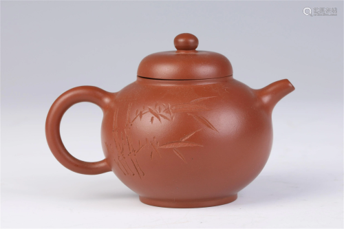A CHINESE YIXING CLAY TEA POT WITH ENGRAVED BAMBOOS