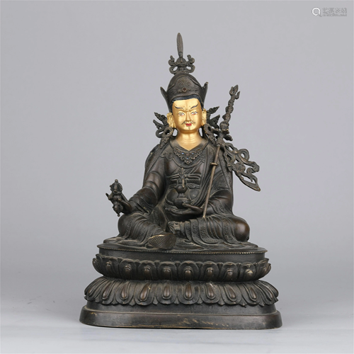 A CHINESE BRONZE STATUETTE OF BUDDHA