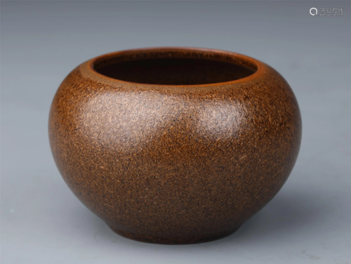 A CHINESE RUST COLORED GLAZE PORCELAIN WATER POT