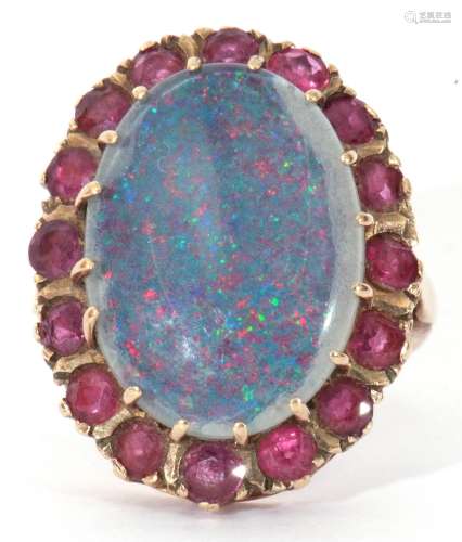 9ct gold opal doublet and ruby ring, the large cabochon opal...