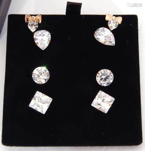 Four pairs of cubic zirconia stud earrings (one pair a/f)