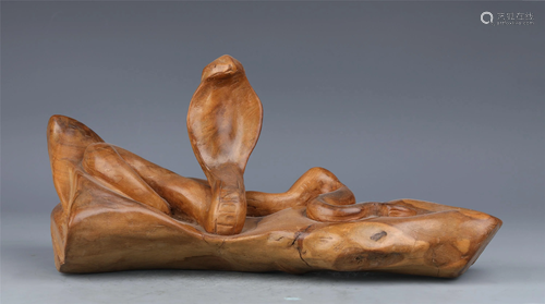 A CHINESE SANDALWOOD CARVED SNAKE SHAPE DECORATION