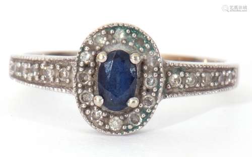 Modern 375 stamped synthetic sapphire and diamond ring, the ...