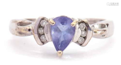Modern 9ct white gold blue coloured stone and diamond ring, ...